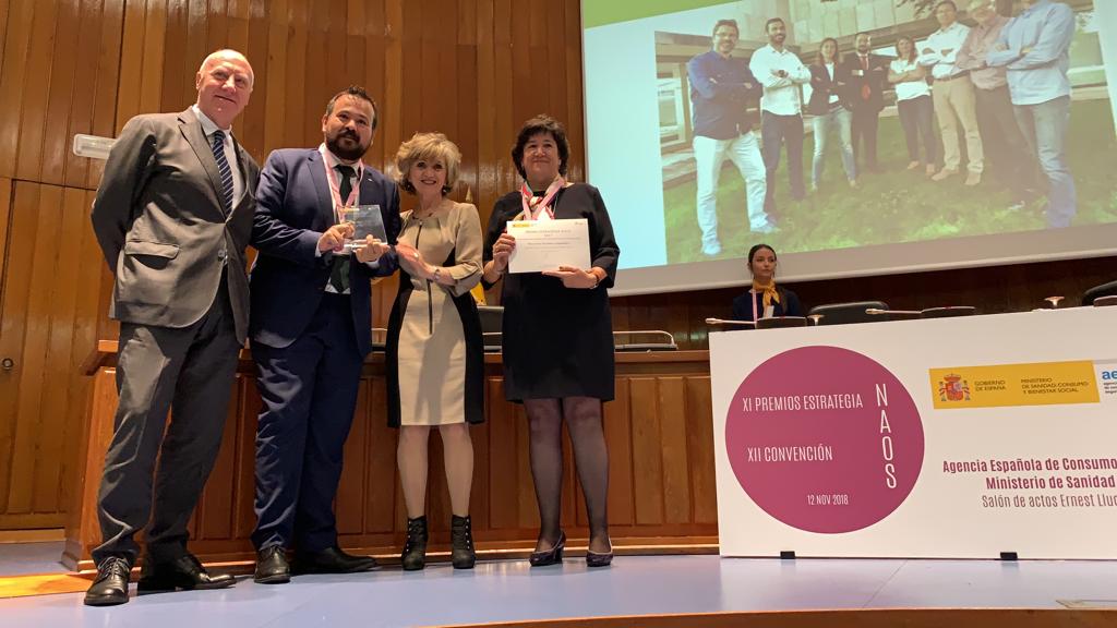 María Dolores López y Juan Ramón Amores recogen el Premio NAOS
