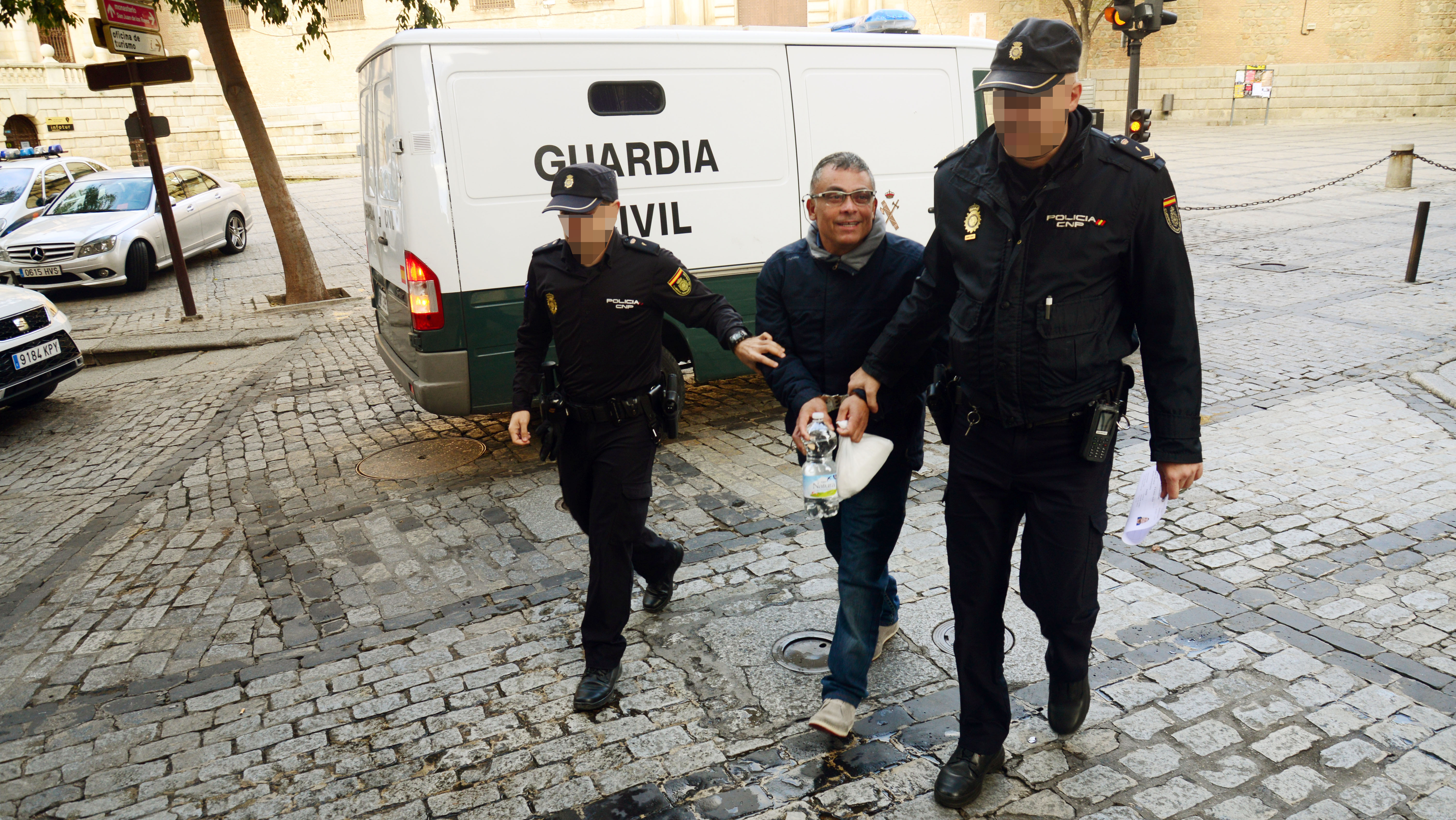 El presunto asesino, justo cuando era trasladado a la Audiencia Provincial de Toledo.