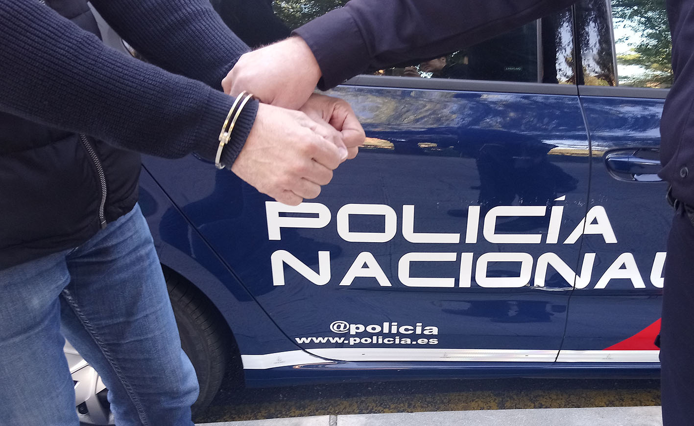 Policía Nacional, vehículo, esposas, detencion, archivo policia,