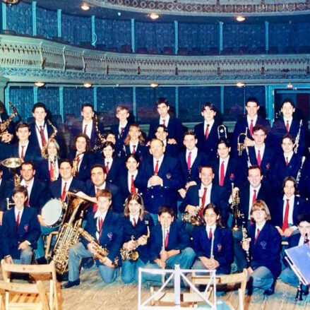"Con la Banda juvenil de Toledo, en el Teatro de Rojas, en un concierto de Santa Cecilia". Es el de la derecha de la fila superior.
