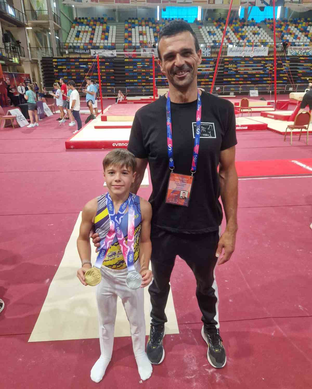 Iván con su entrenador