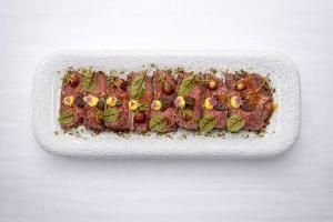 Un plato con carne de avestruz del restaurante Impala de Talavera